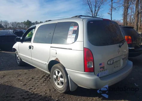 2002 Nissan Quest Gxe z USA, uszkodzony, nr VIN 4N2ZN15TX2D809502